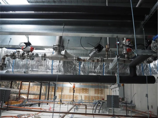 View of steam installation in ceiling space