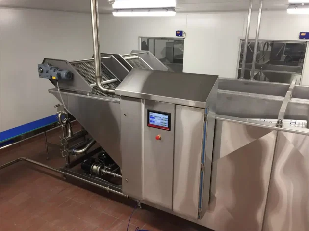 View of the Linear Chiller bagged food out feed conveyor