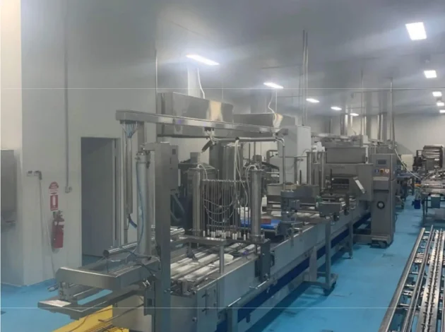 View of FMA sheeted pastry line that assembles filed pies